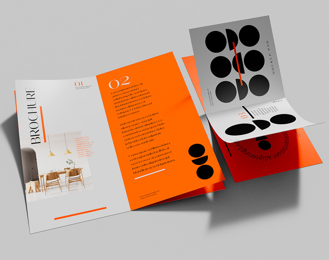 an open orange and black brochure